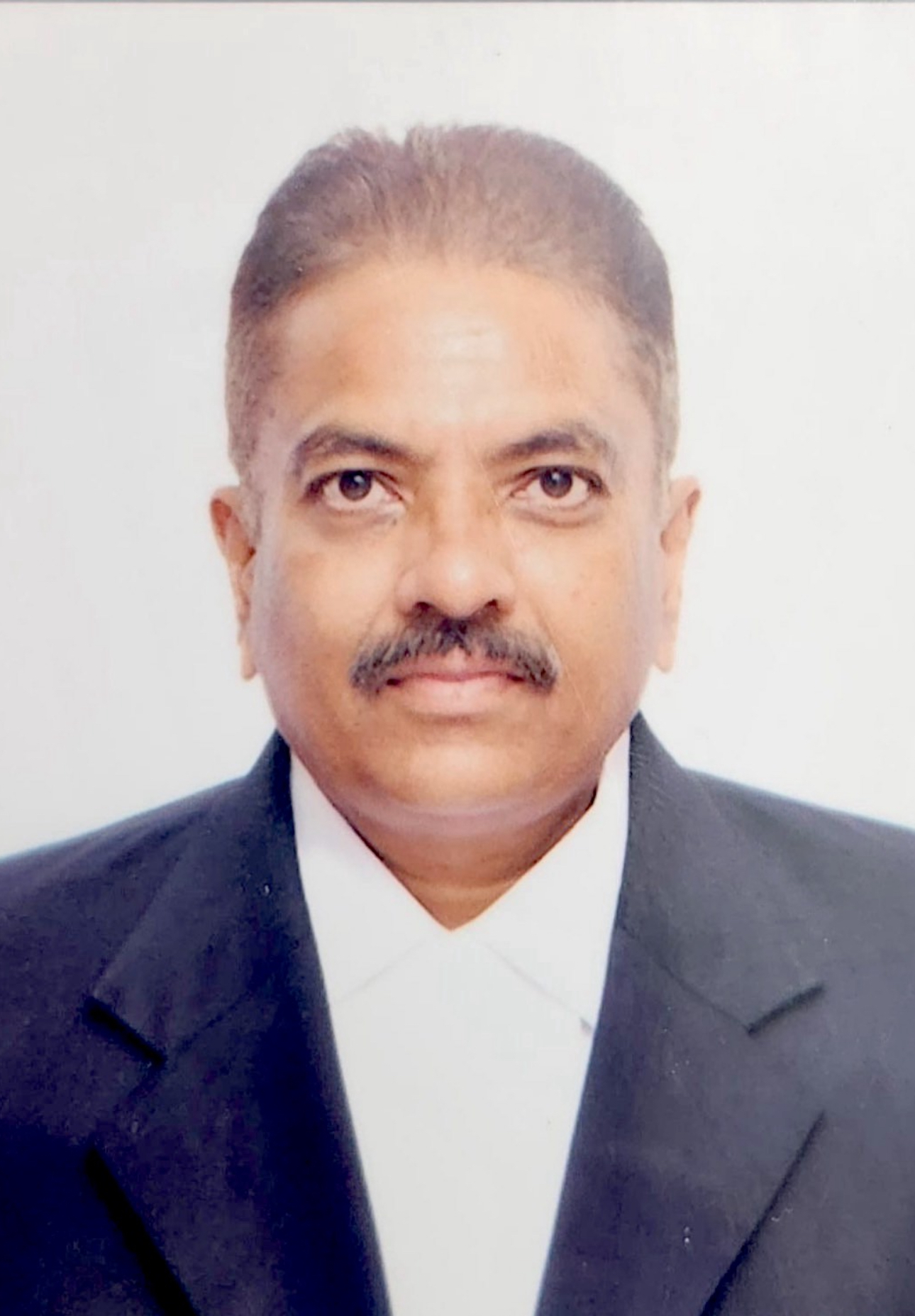 Dr. Adv. Bhooshan B. Agalgatti